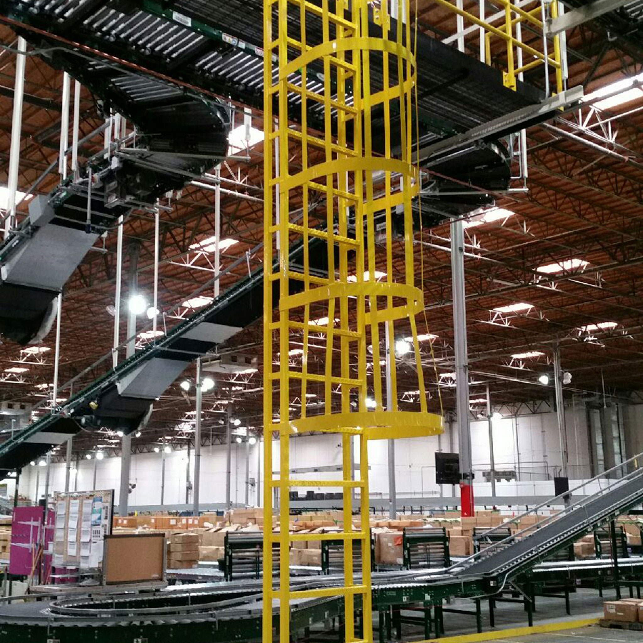 Photo of custom fabricated metal caged ladder